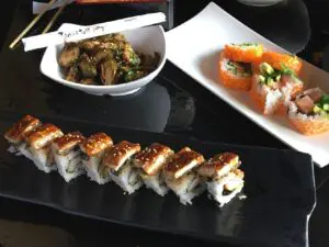 sushi rolls and a bowl of meal
