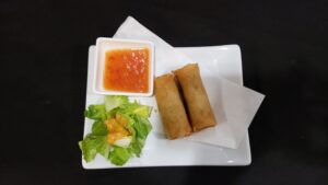 fried spring roll with sauce and sides